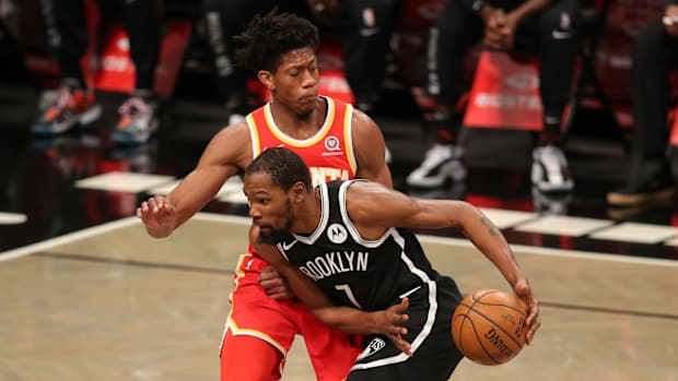 De'Andre Hunter guarding Kevin Durant.